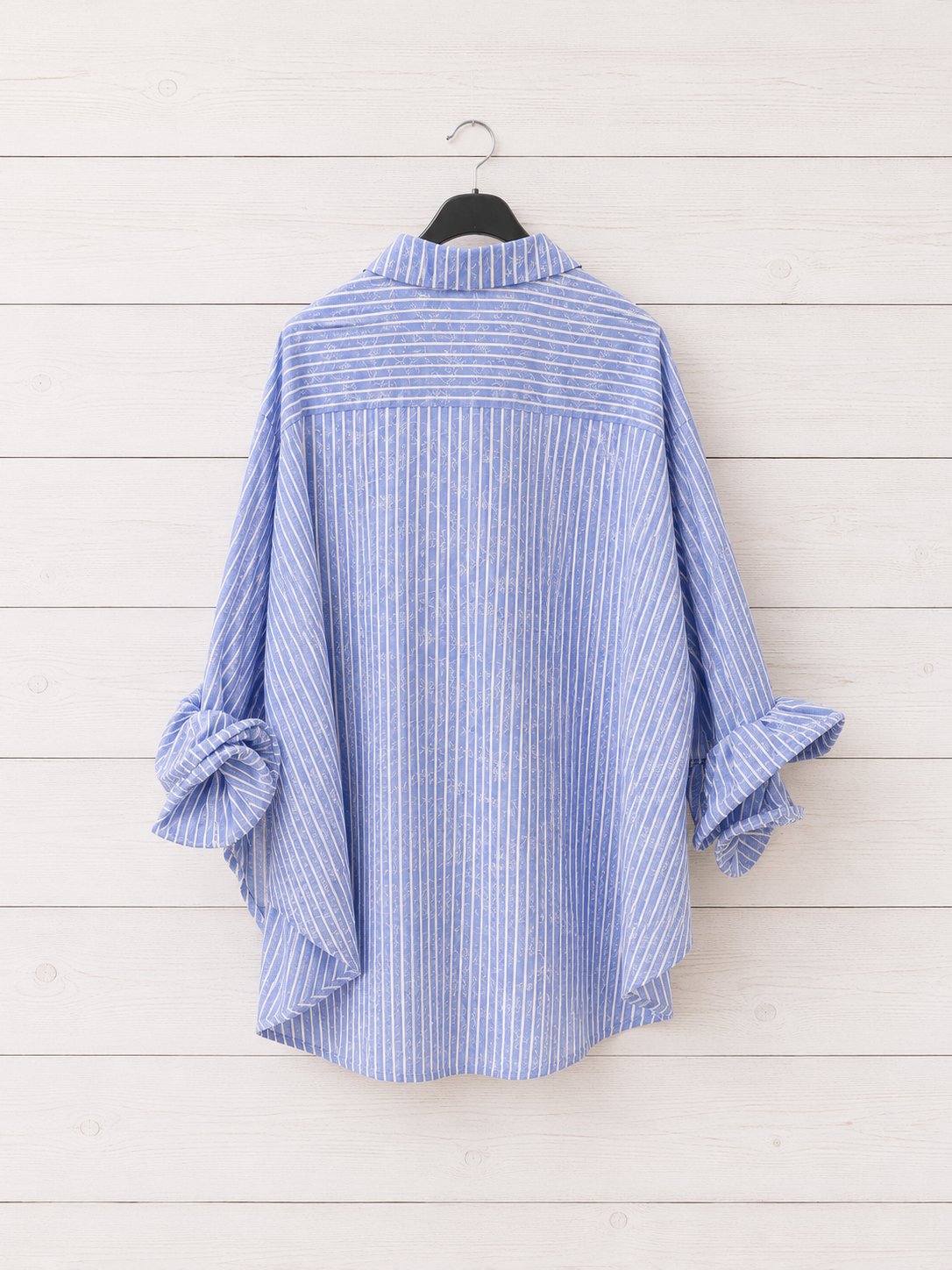 Camicia a righe con fiore