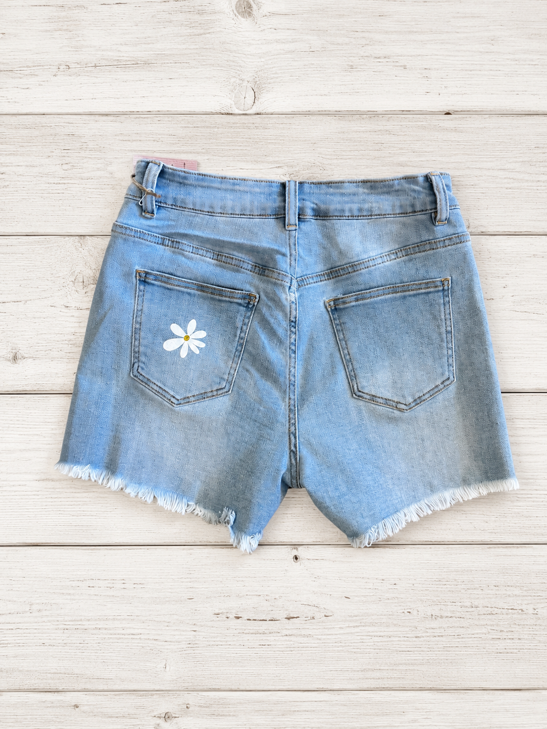 Shorts jeans con margherite in glitter